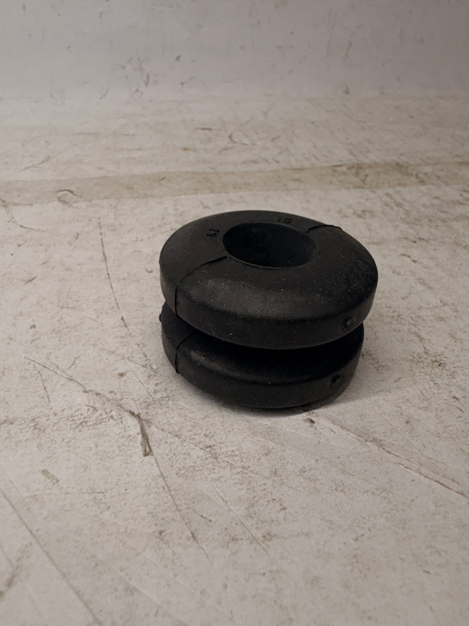 Rubber cushion strut bar for Tavera by General Motors, featuring durable rubber padding and metal mounting components.