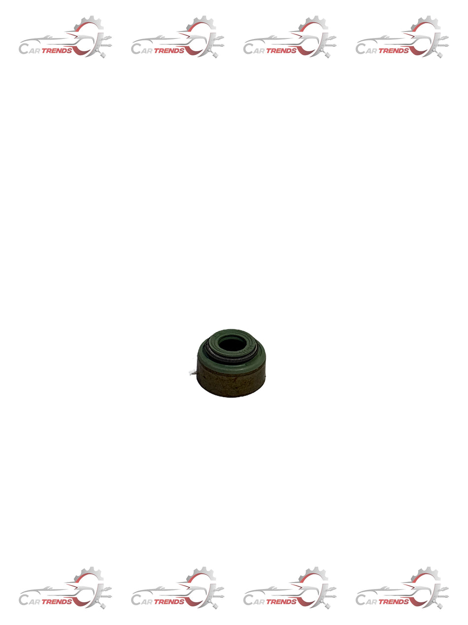 General Motors exhaust valve stem seal for Forester, part F13211AA110, shown in a close-up image.