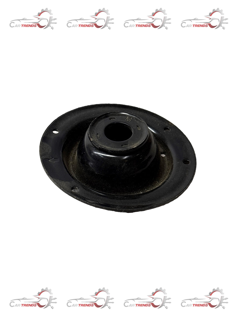 Front seat spring upper for GM vehicle, showing a close-up of the coil spring component with metal construction.