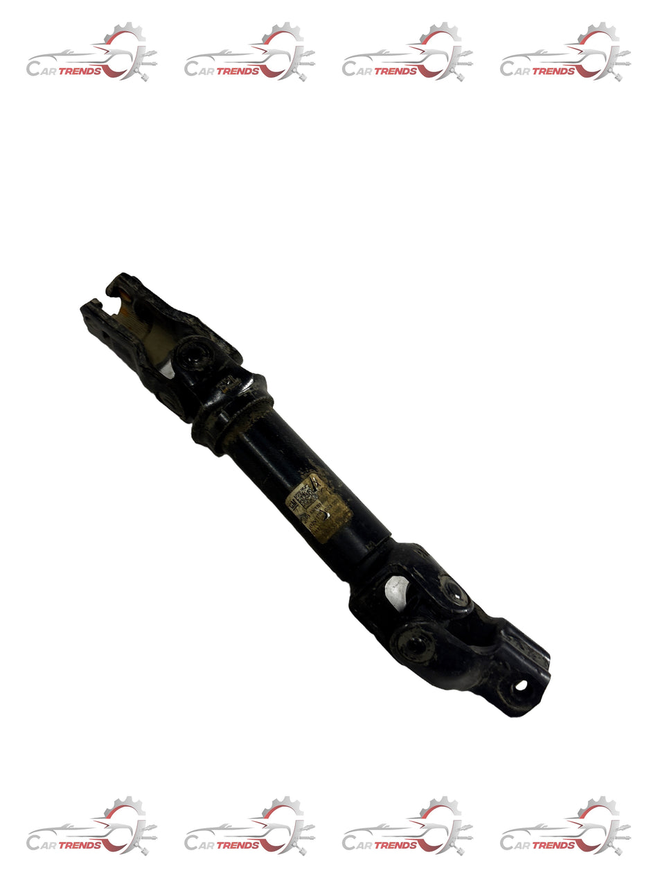 General Motors steering shaft for Cruze, part J13251807, showing the metal component with detailed connection points.