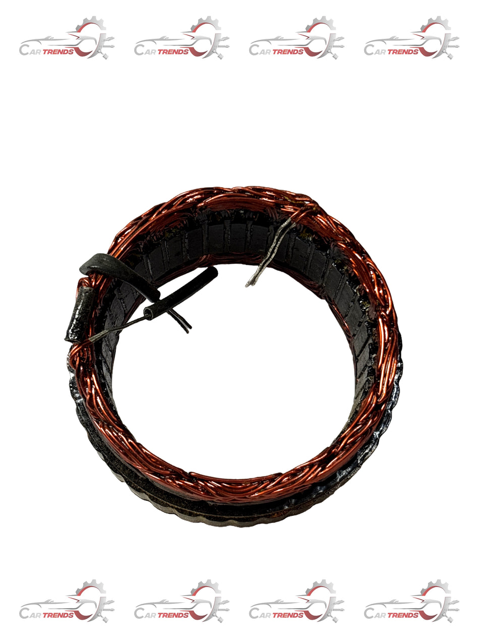 General Motors stator winding assembly Spark J28296311 showing detailed copper wire coils and electrical components.
