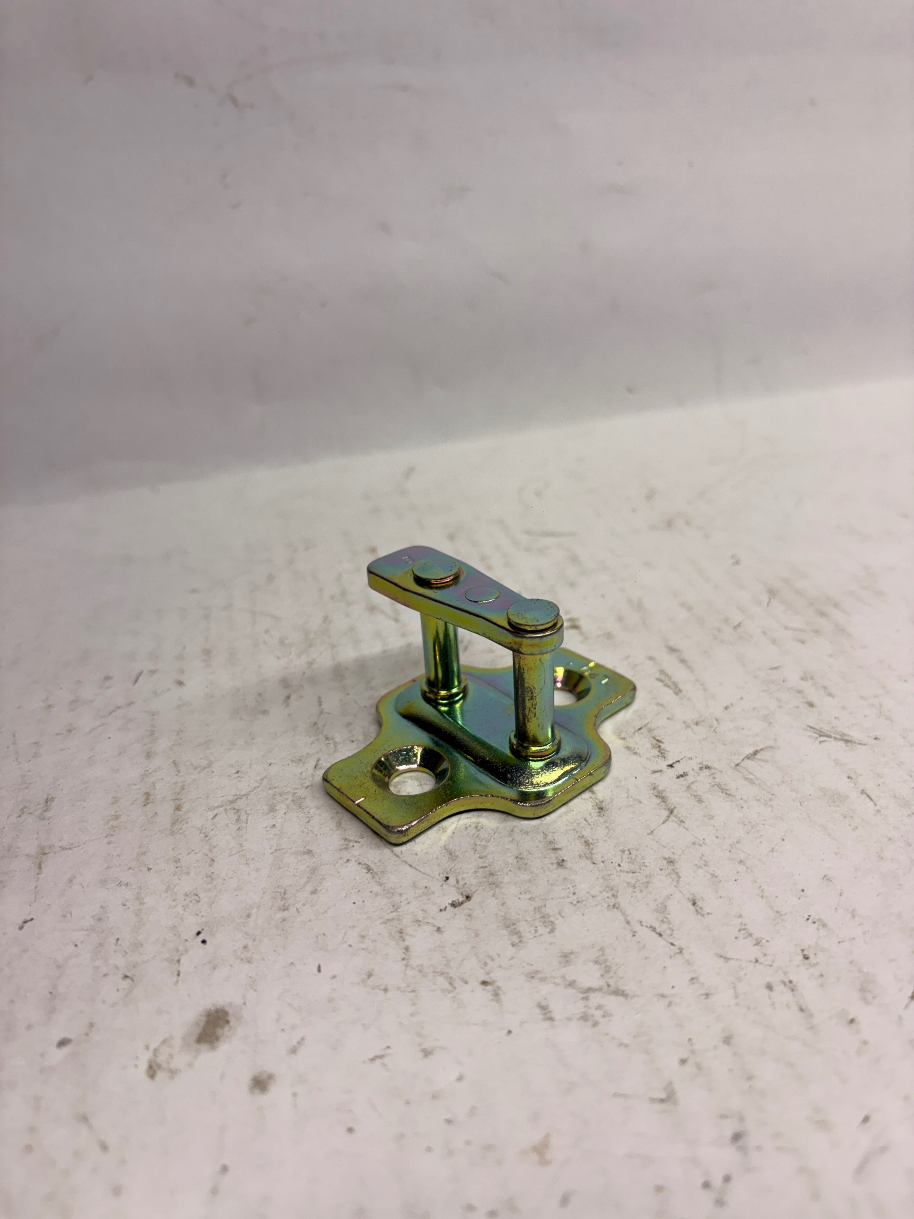 General Motors Striker A door for Optra Petrol model, part J95040624, showing the metal door latch component.