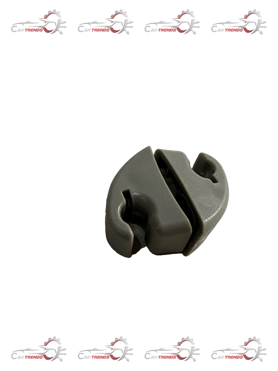 General Motors Sunvisor Holder for Spark vehicle, black plastic with clip design, mounted on car’s sun visor.
