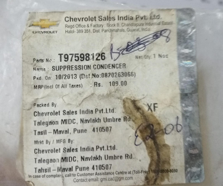 General Motors Tavera suppression condenser, auto part for Tavera vehicle, showing the condenser component.