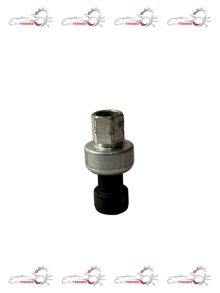 General Motors Optra petrol pressure transducer switch, close-up view showing connection points and sensor details.