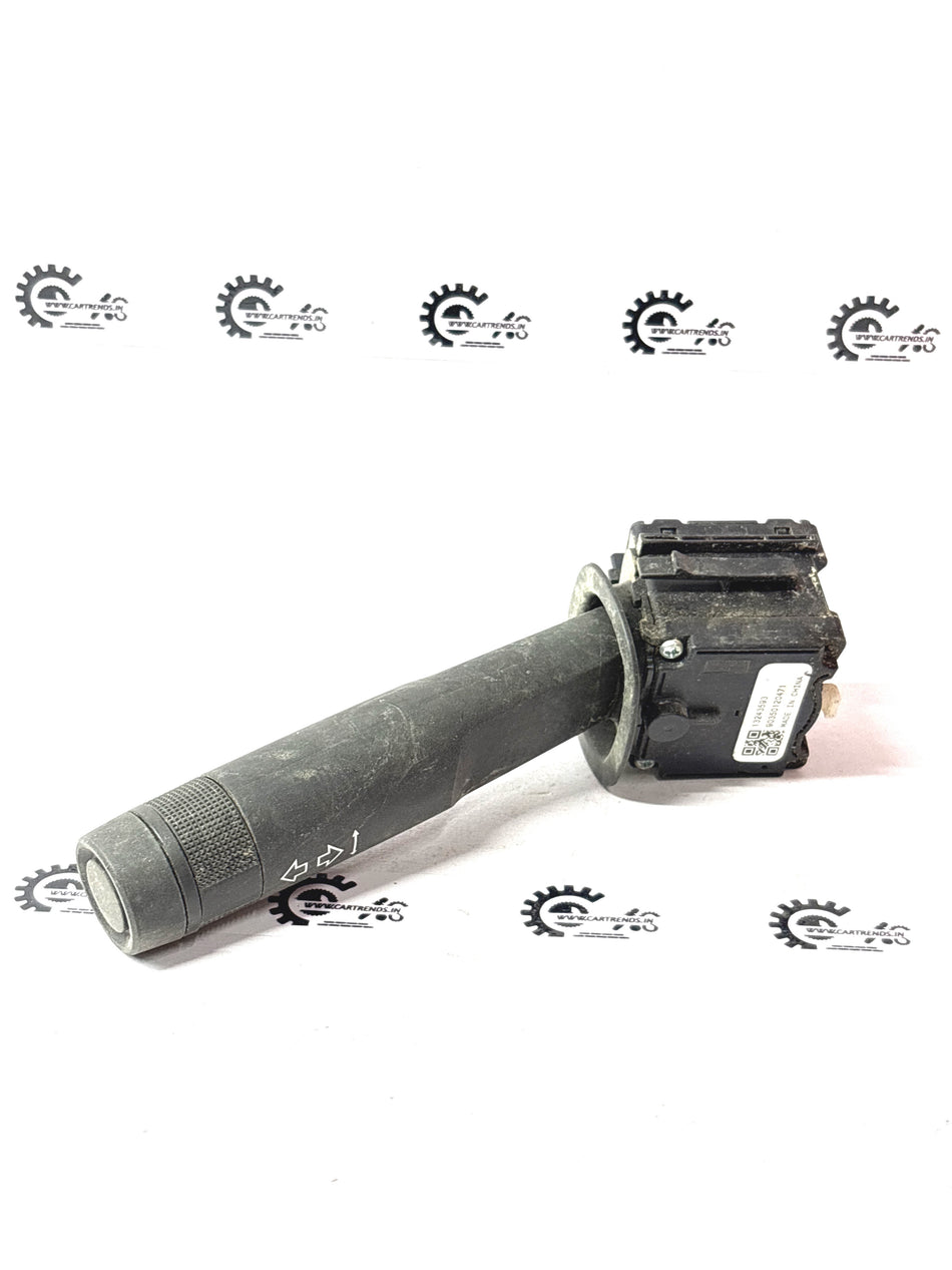 General Motors turn signal switch for Cruze J13243593, automotive part with switch lever and electrical connectors.