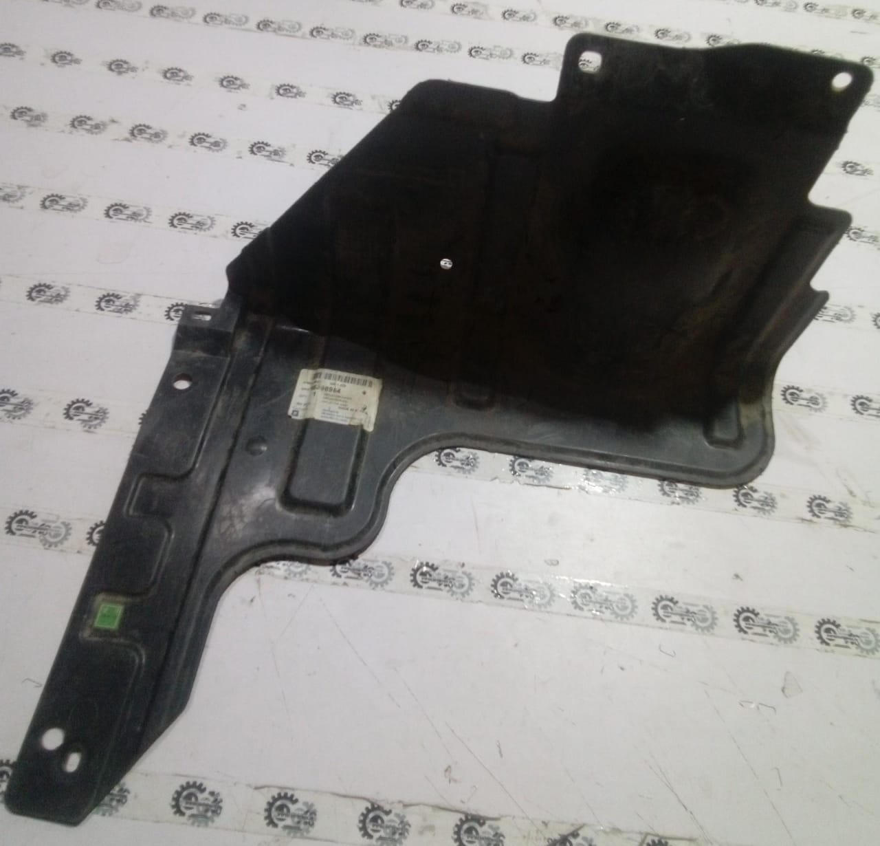 Water deflector for Chevrolet Aveo by General Motors, designed to protect against water intrusion on vehicle windows.