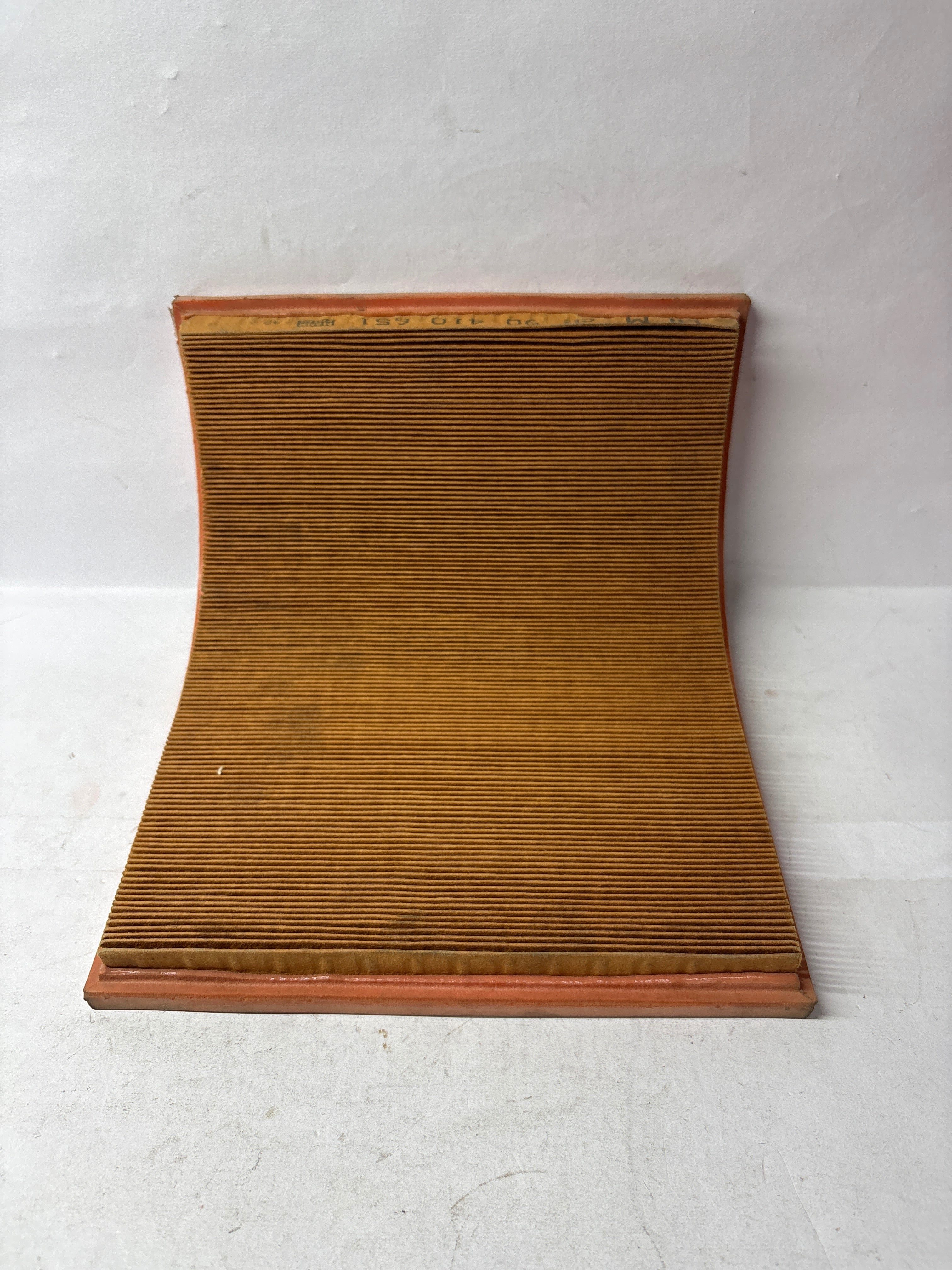General Motors Astra air filter spare part, rectangular filter with pleated design for vehicle air intake system.