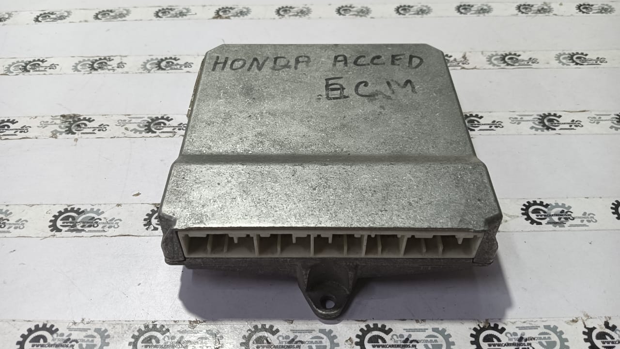 Honda Accord electronic control module part 37820RCBY81, close-up view of the vehicle component with wiring connections.
