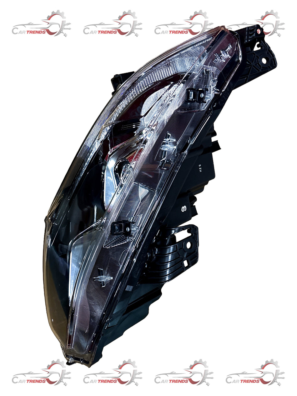 Honda Civic right head light assembly, model 33100TEA305, showing the lens and housing for vehicle lighting.