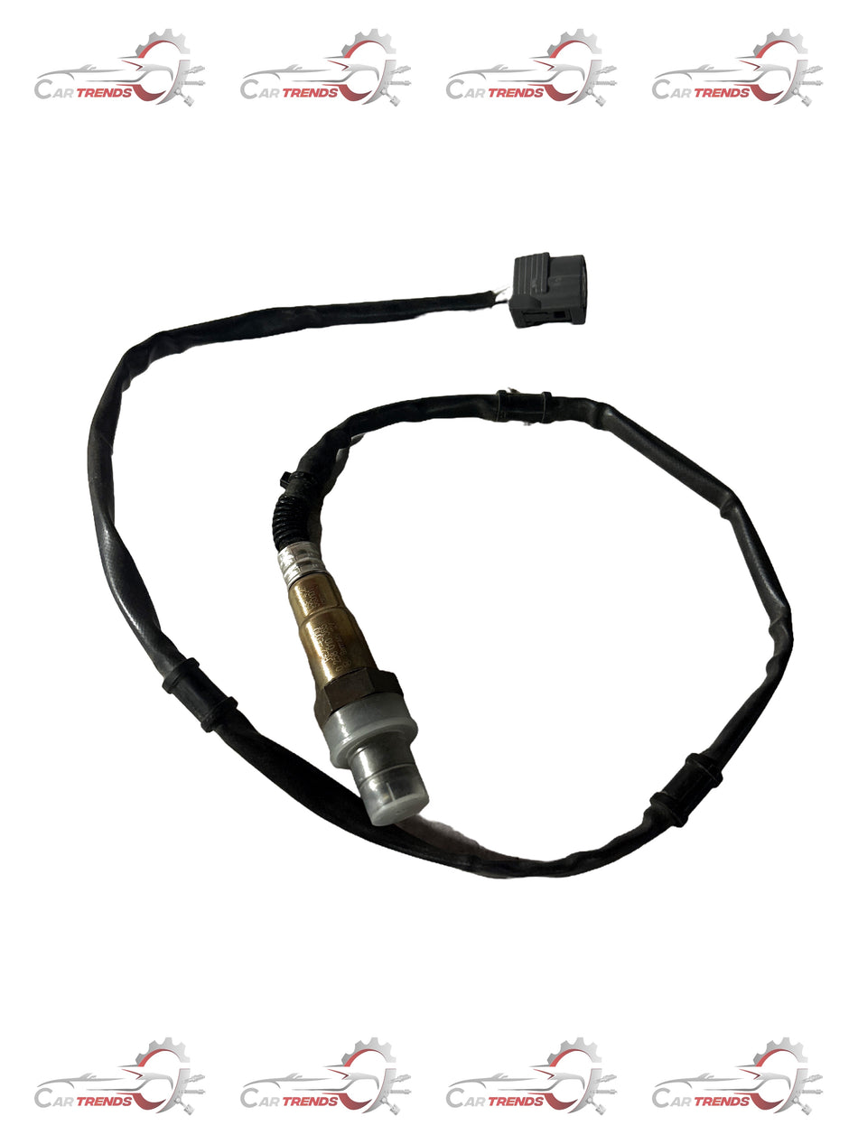 Honda Brio oxygen sensor, part 36532RE2E01, shown installed in the engine for optimal vehicle performance.