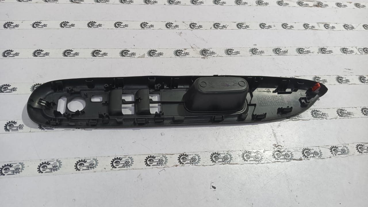 Honda Amaze first-generation right front door armrest assembly with integrated handle and textured surface.