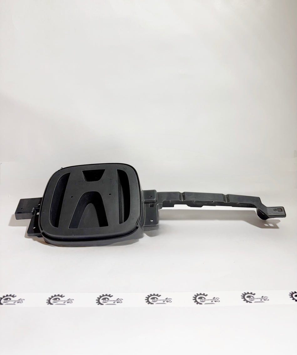 Honda grille emblem, chrome finish, designed for Honda vehicles, featuring the model-specific logo and branding.