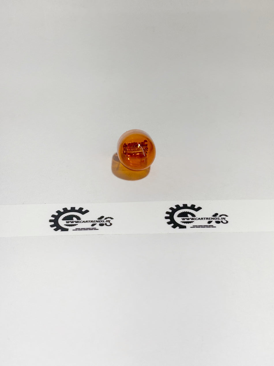 Honda 12V 21W wedge light bulb, showing the clear glass and metal base, designed for automotive headlight or indicator use.
