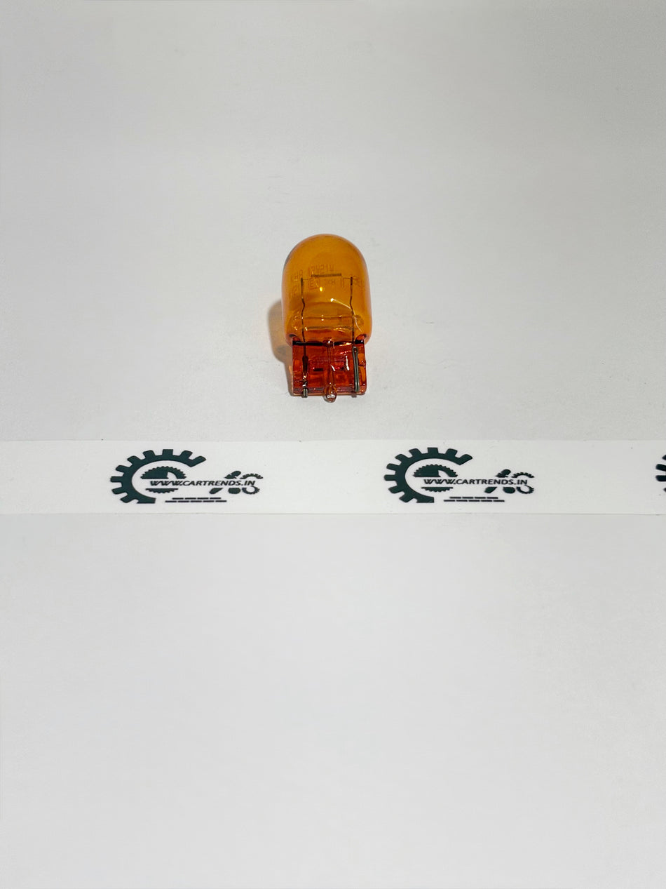 Honda 12V 21W wedge light bulb for vehicle lighting, shown in a close-up image with the bulb's base and filament visible.