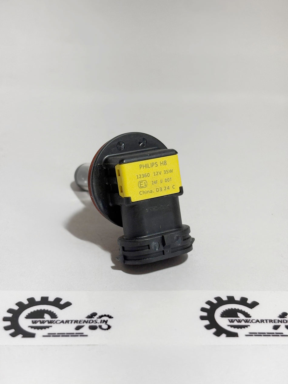 Honda BULB H8(LL) 33165TL0003, automotive headlight bulb for Honda vehicles, shown in a close-up image.
