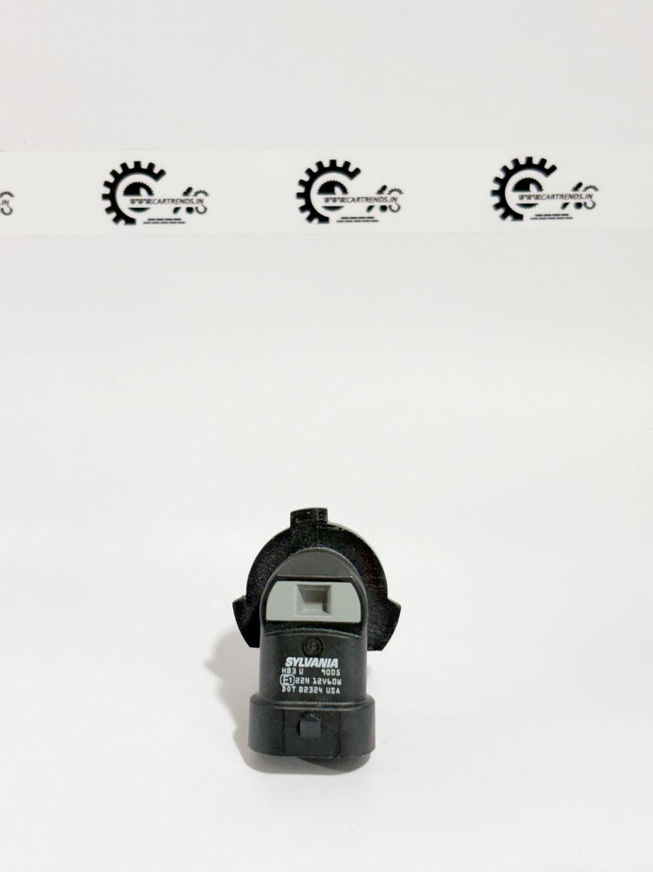 Honda HB3 33115TAAJ01 headlight bulb, halogen light for Honda vehicles, shown in a close-up view.