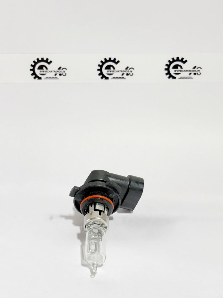 Honda HB3 33115TAAJ01 headlight bulb, compatible with Honda vehicles, shown in close-up with a clear view of the bulb.