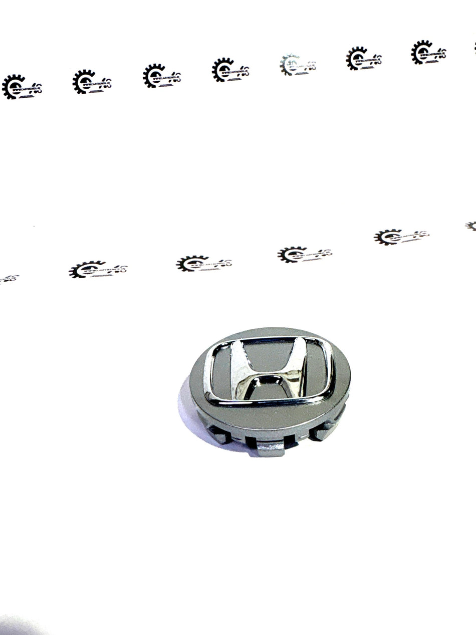 Honda wheel center cap assembly in silver for Honda vehicles, part number 44732T02T11, shown on a white background.