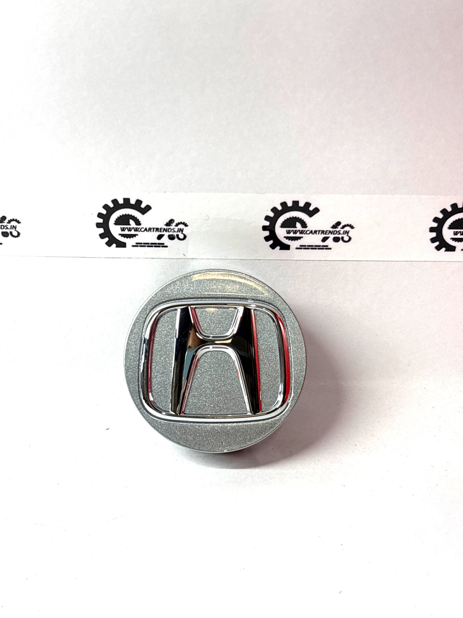 Honda wheel center cap assembly with aluminum finish, model 44732TD4J00, designed for Honda vehicles, visible in the image.