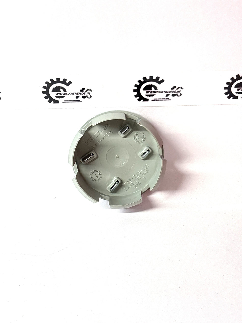 Honda wheel center cap assembly for Honda vehicles, model 44732TD4J00, with a sleek design and durable construction.