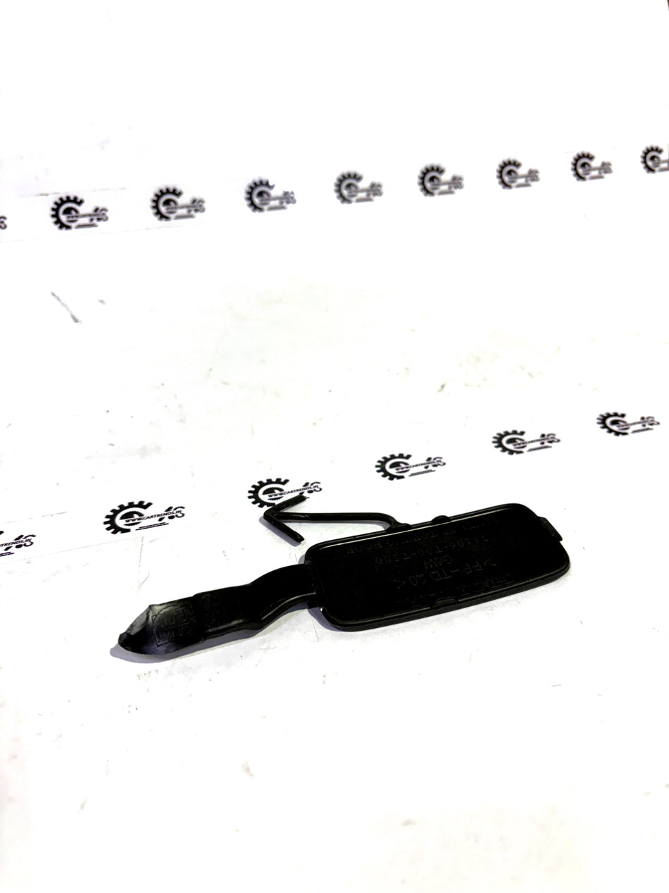 Honda COVER.FR towing hook 71106T00T50ZA, automotive accessory, close-up view showing the hook attached to the vehicle.