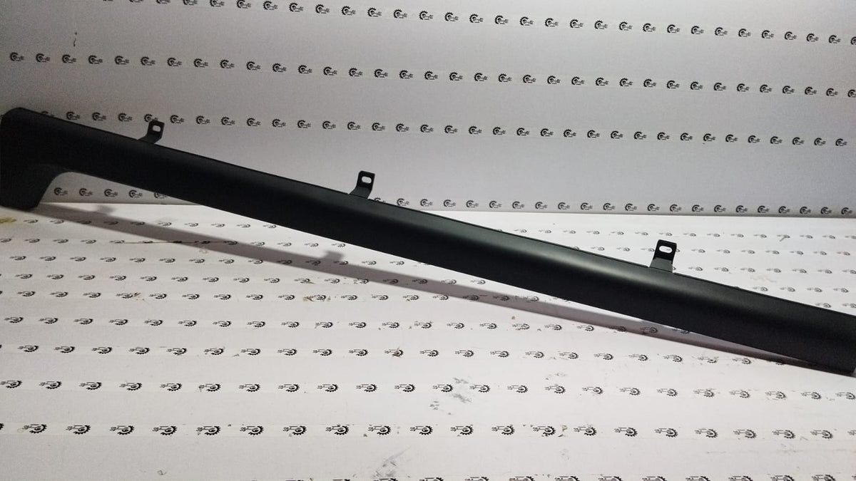 Honda WRV left running board garnish with black finish, visible mounting details and sleek design.