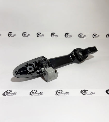 Honda right rear door handle assembly, part number 72640TG2K01, shown on a vehicle in a close-up view.