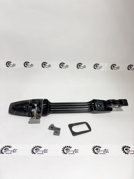 Honda handle assembly for right rear door, part number 72640TG2K01, featuring a durable exterior design.