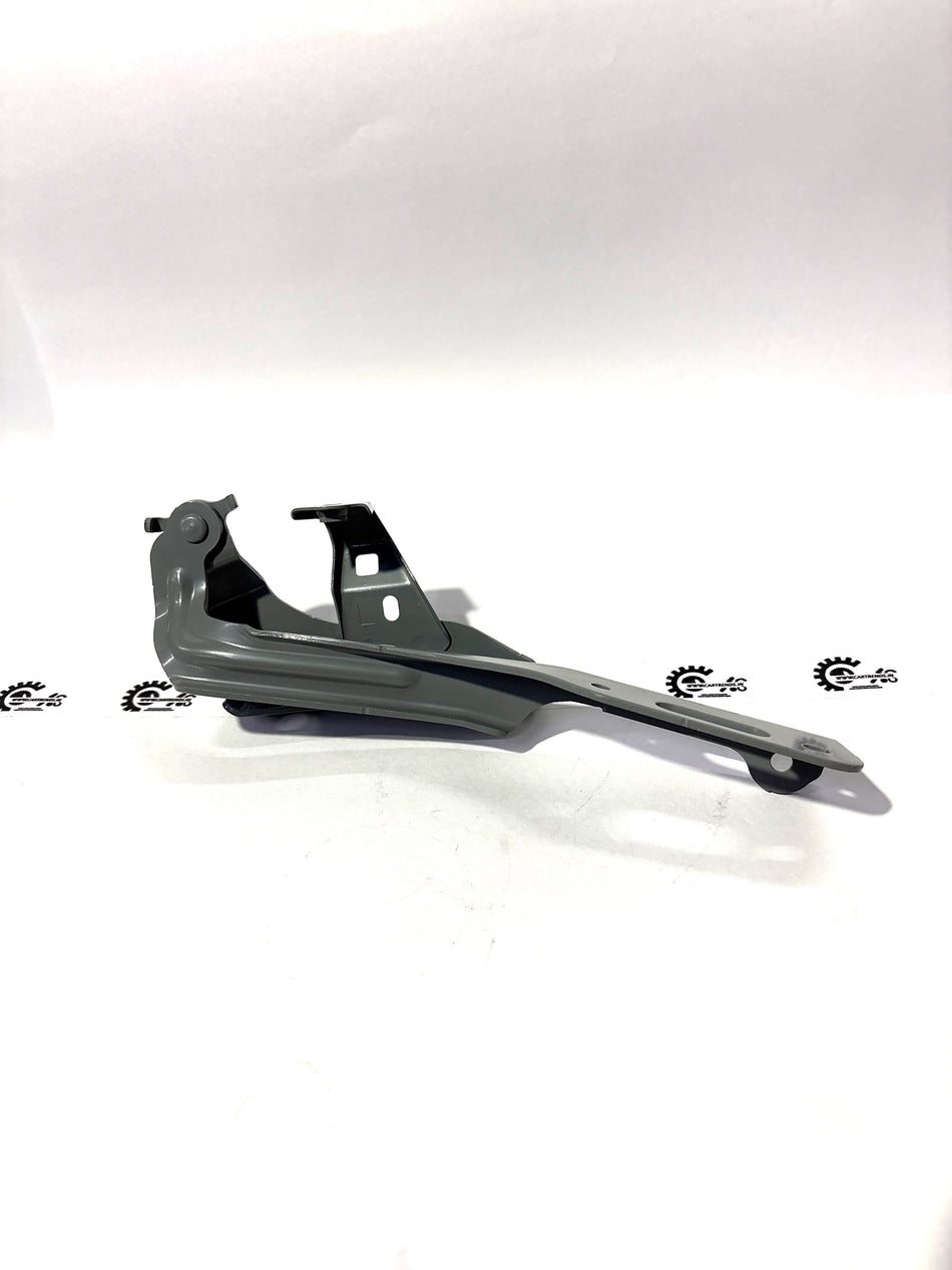 Honda hood hinge component, left side, part number 60170TBAA00ZZ, showing the metal hinge for vehicle front hood.