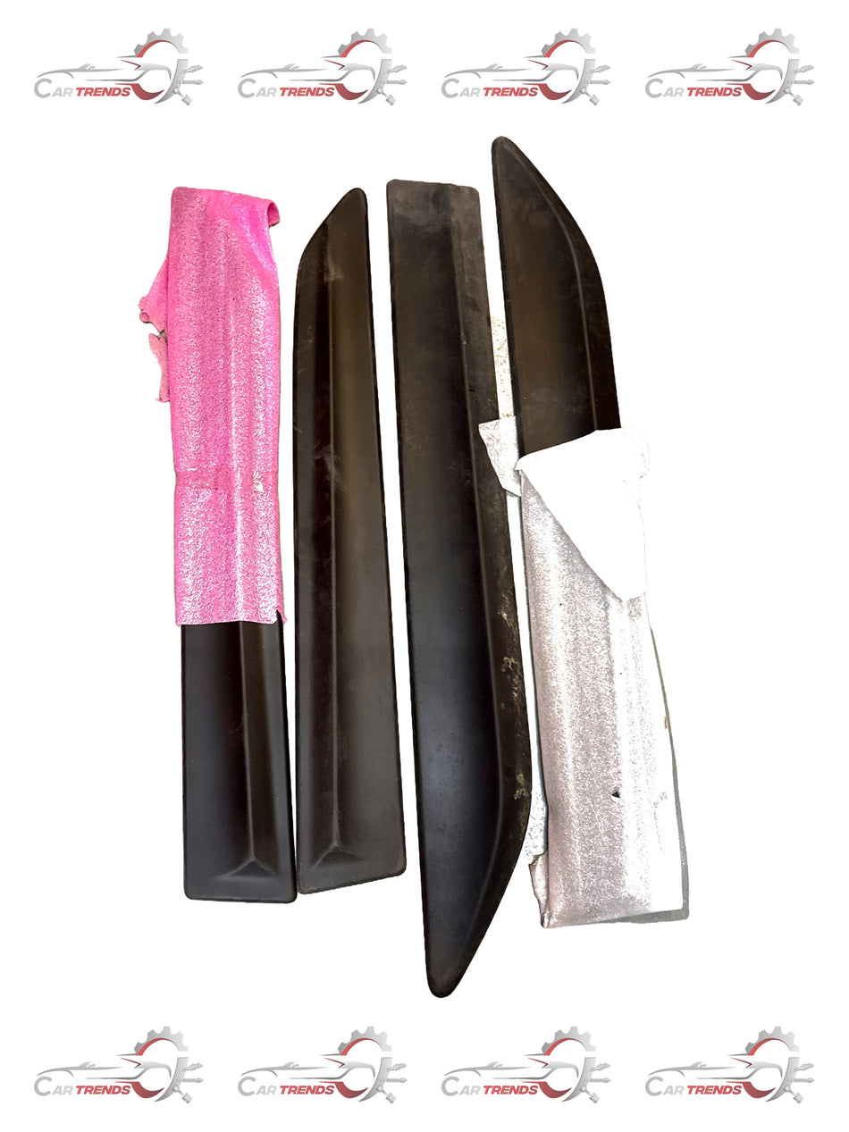 Honda body side molding kit, model 08P05TSC700, installed on vehicle, showcasing sleek side protection and trim detail.