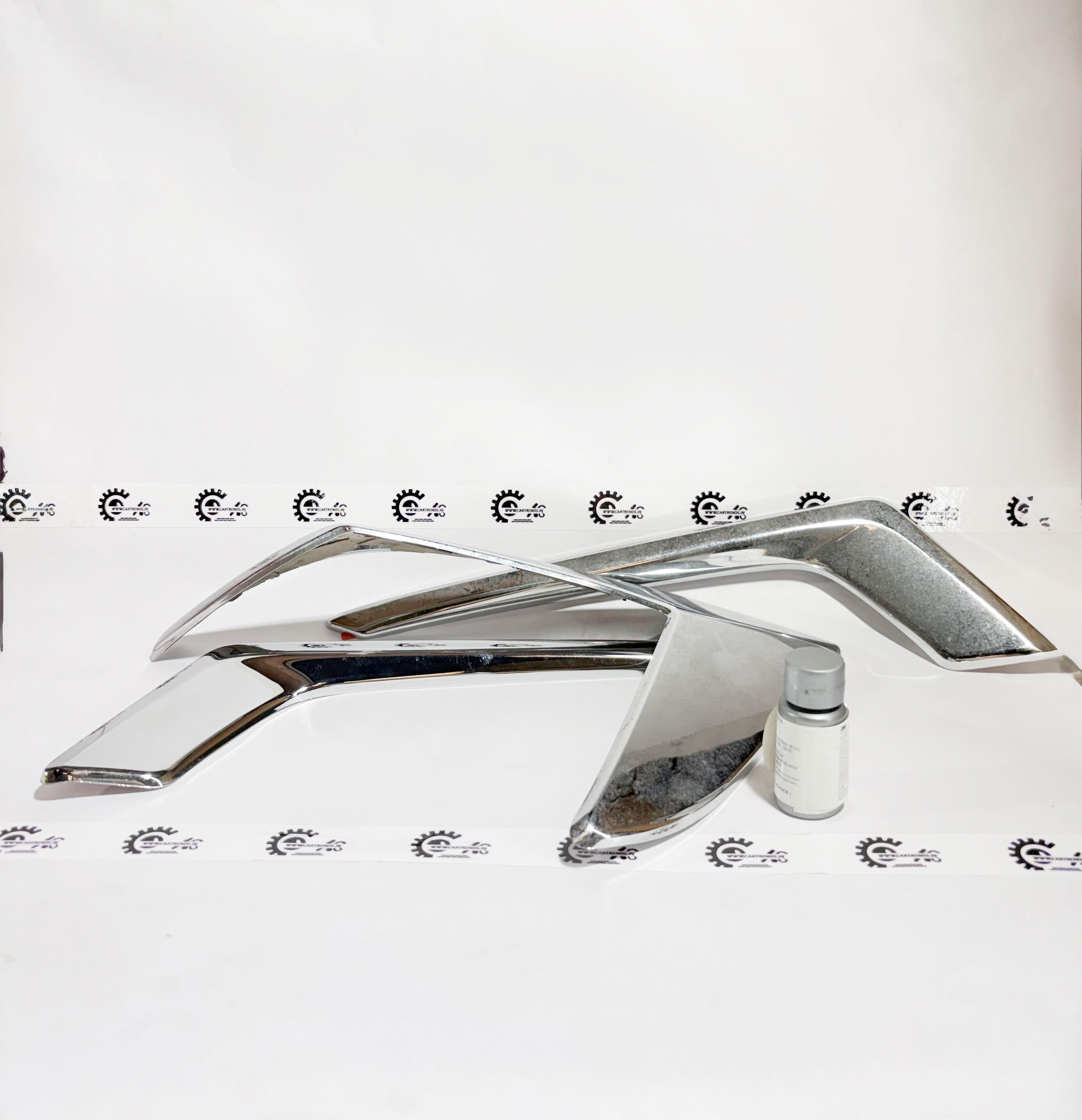 Honda fog and tail lamp garnish kit, part 08Z01TSV700A, shown on a Honda vehicle with sleek black finish.
