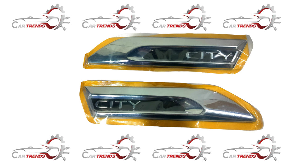 Honda front fender garnish kit in black, featuring sleek design and durable material, suitable for Honda vehicles.