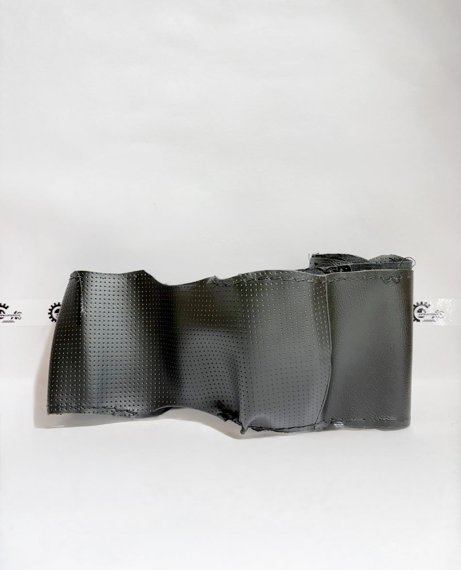 Honda steering wheel cover kit, black and textured, designed to fit Honda vehicles for enhanced grip and style.