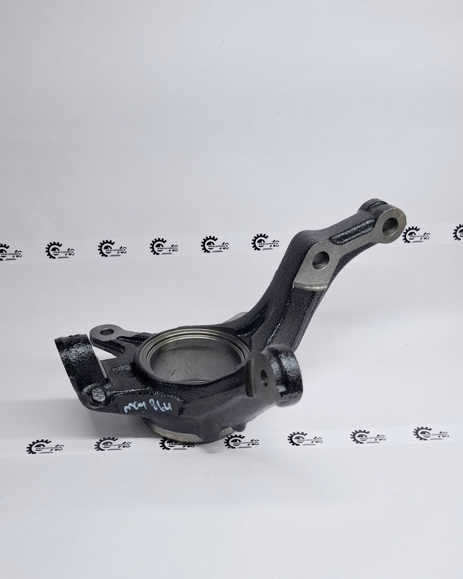 Honda KNUCKLE.R FR 5121131XT00 vehicle part, showing the front right knuckle assembly with visible metal components.