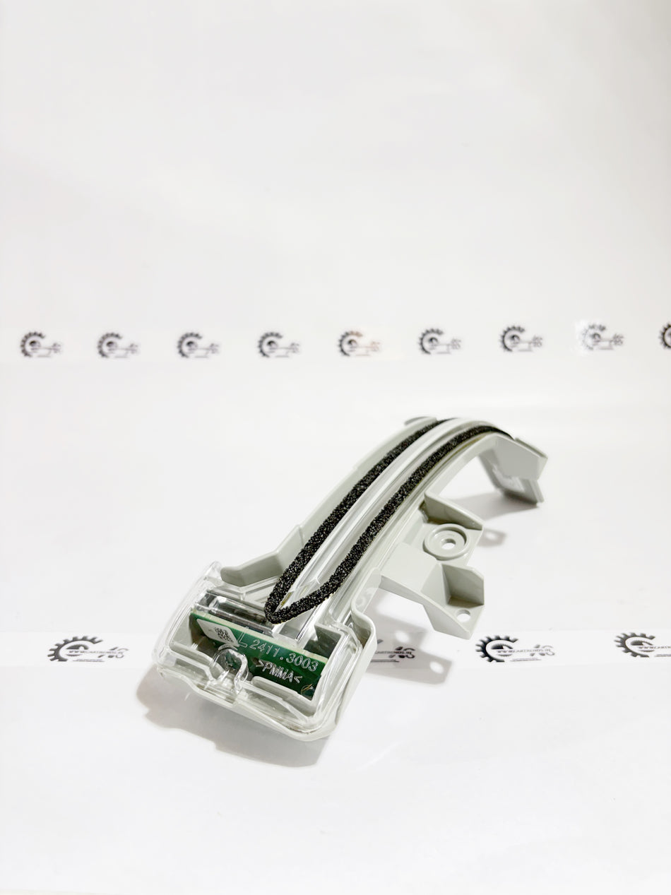 Honda light assembly L side turn signal for Honda vehicles, showing the clear lens and mounting components.