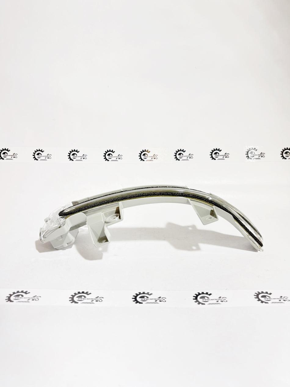 Honda light assembly for left side turn signal, model 34350T00K01, showing the plastic housing and electrical components.