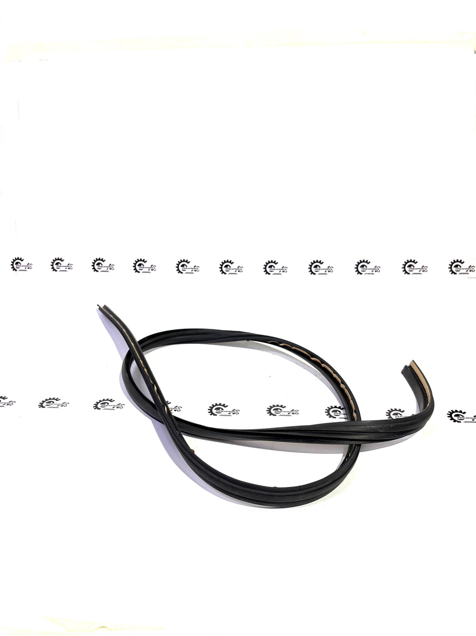 Honda rubber wheel shield dam part 73226T4TT00, close-up of black rubber component for vehicle protection