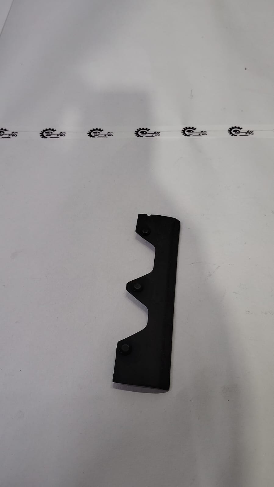 Honda seal rubber for left hood, model 74192TG1T00, shown in black rubber with a textured surface.