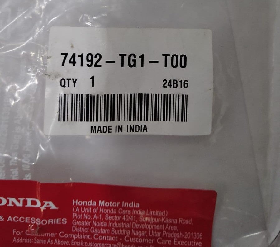 Honda seal rubber for left hood, part number 74192TG1T00, shown installed on vehicle in a close-up view