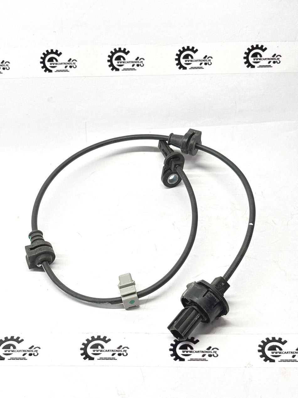 Front sensor assembly for Honda vehicle, part number 57450TG2D01, showing the sensor component with wiring and mounting bracket.