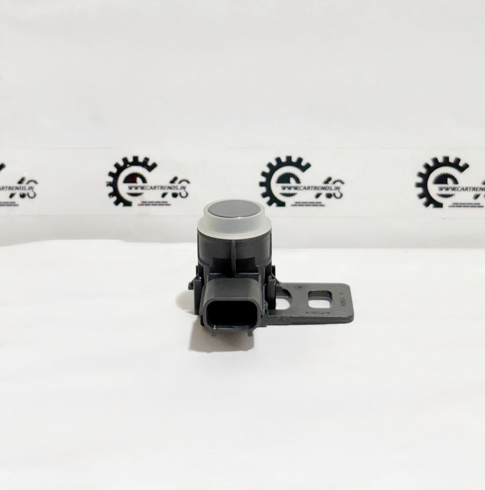 Honda parking sensor assembly with clip, model 39680T00D21ZF, shown installed in a vehicle's bumper.