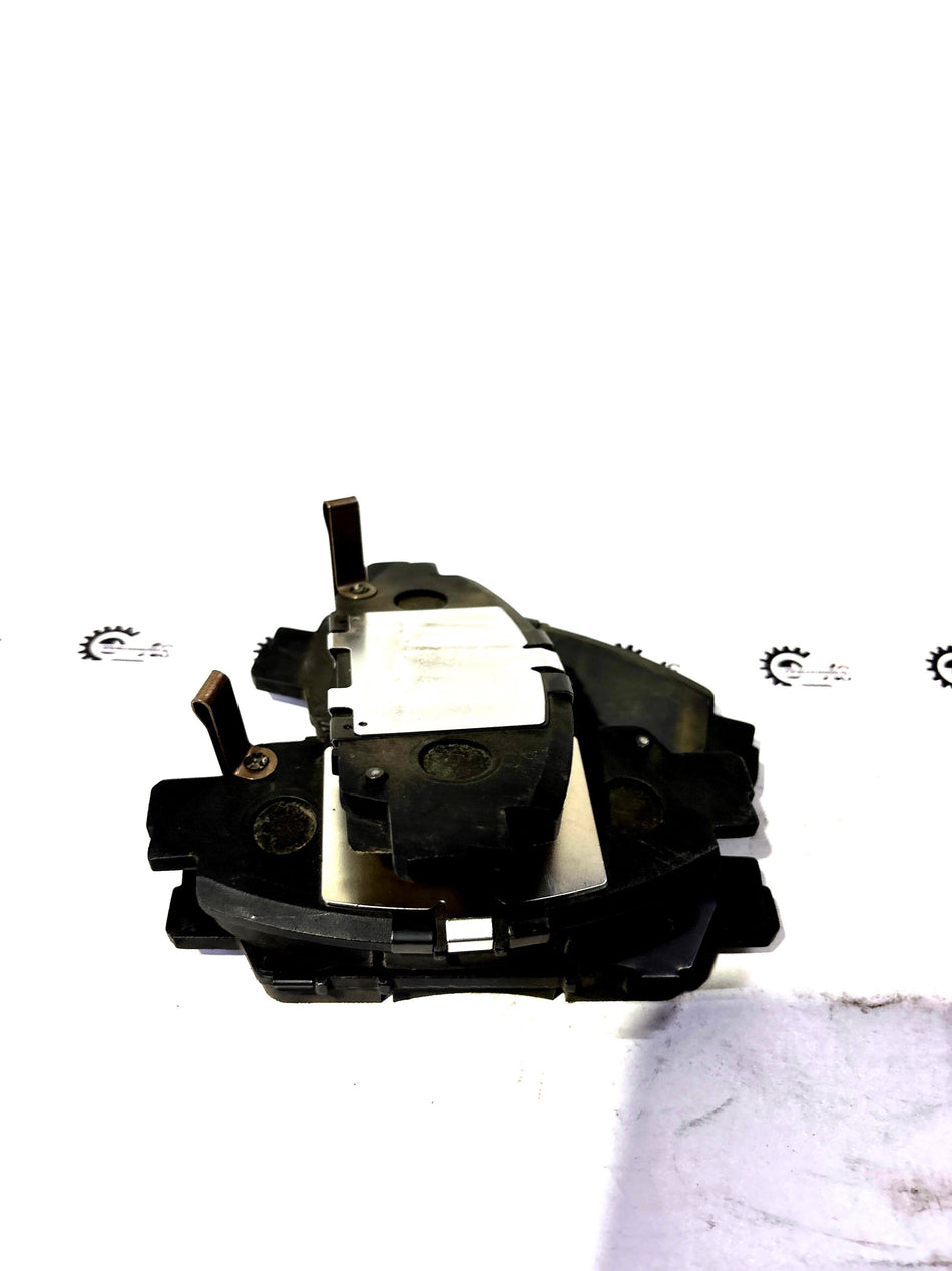 Honda front brake pad set, model 17CL-15VN-23T-NF12, for Honda vehicles, showing the brake pads with mounting hardware.