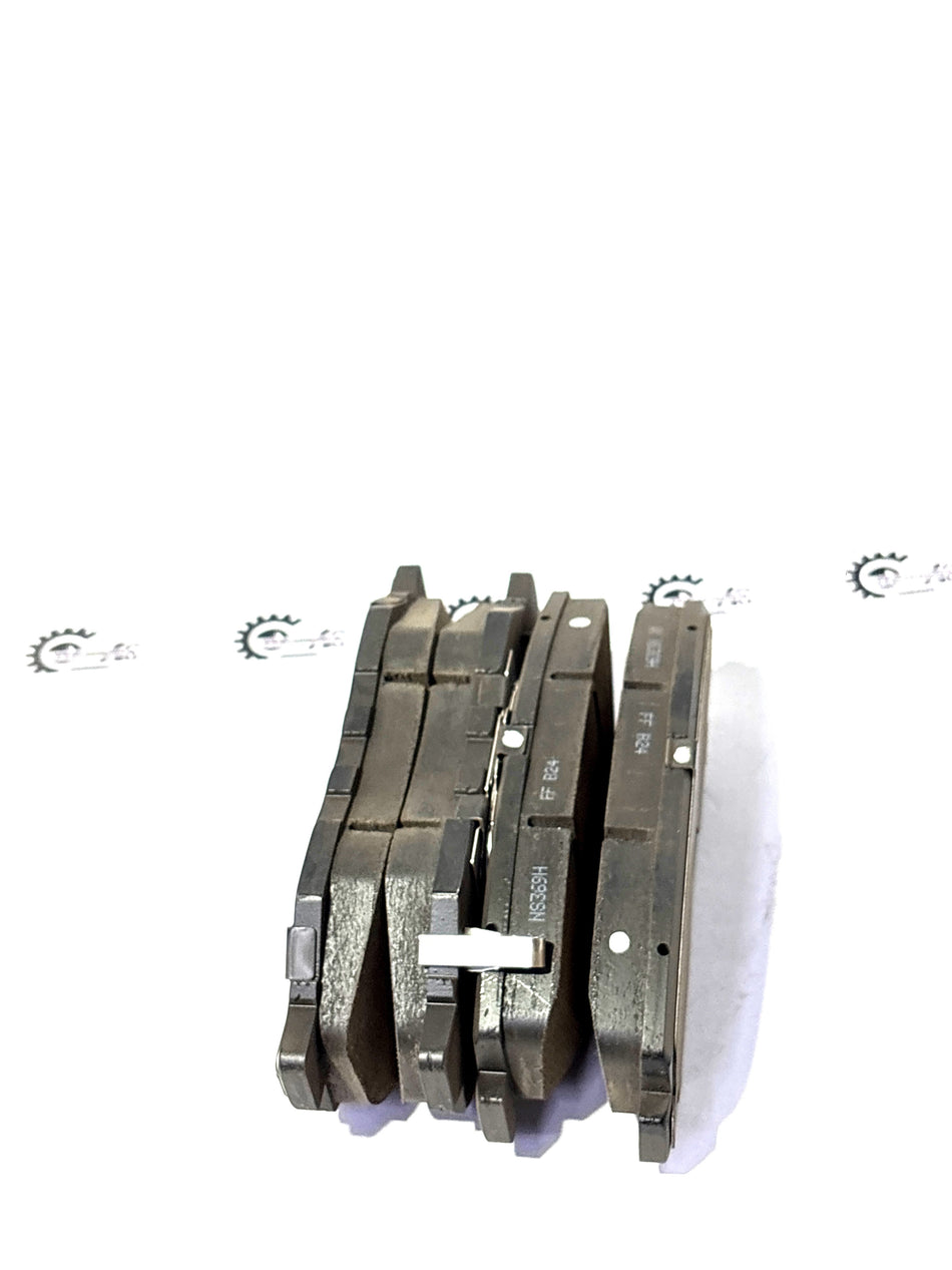 Honda front brake pad set for AD57-15 models, shown in black with metal backing, designed for Honda vehicles.