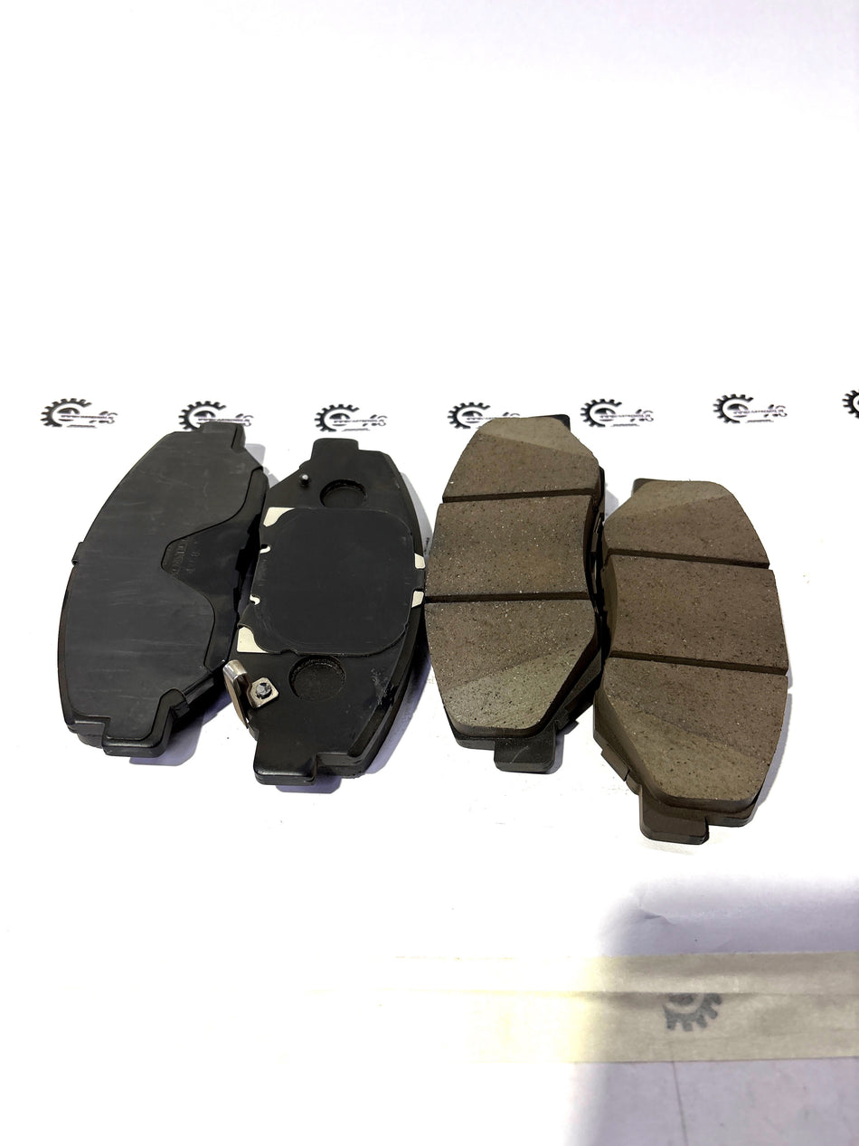 Honda front brake pad set for AD57-15 models, featuring durable replacement pads for reliable stopping power.