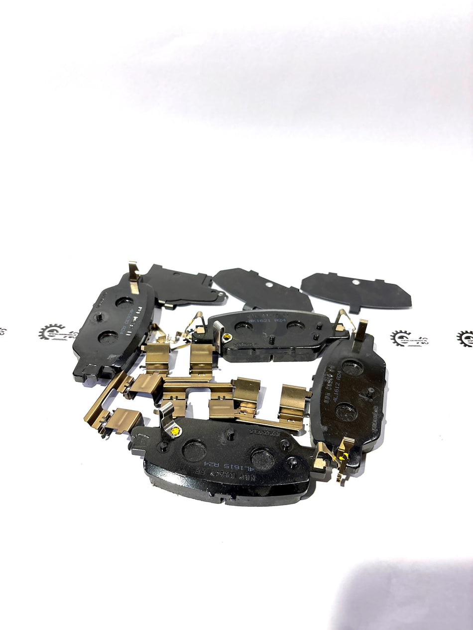 Honda SET.PAD RR 43022TLAA00 brake pad set for motorcycle, showing the black brake pads with metal backing plates.