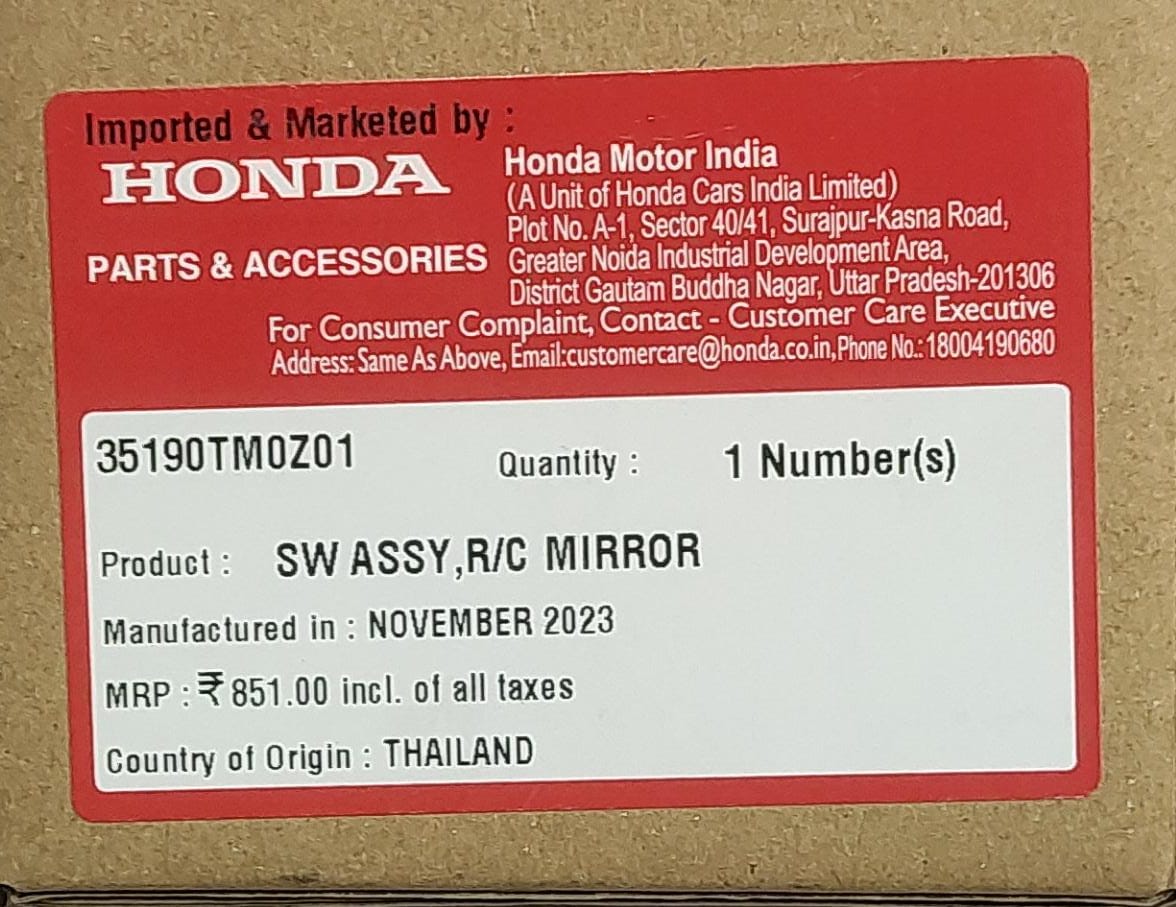 Honda rearview mirror assembly, part number 35190TM0Z01, designed for Honda vehicles, shown in the image with mirror and mounting components.