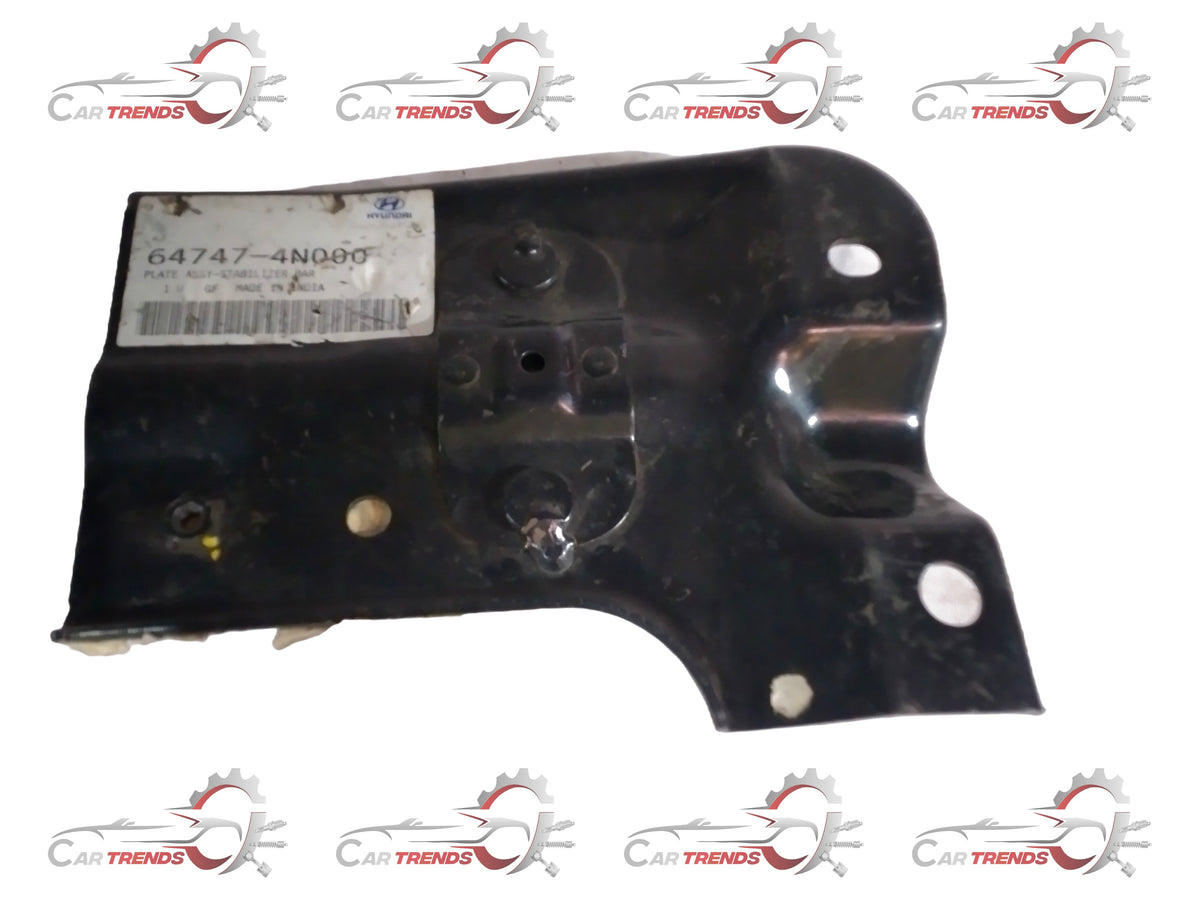 Hyundai 647474N000 car part in black, close-up view showing detailed component with Hyundai branding and model number.