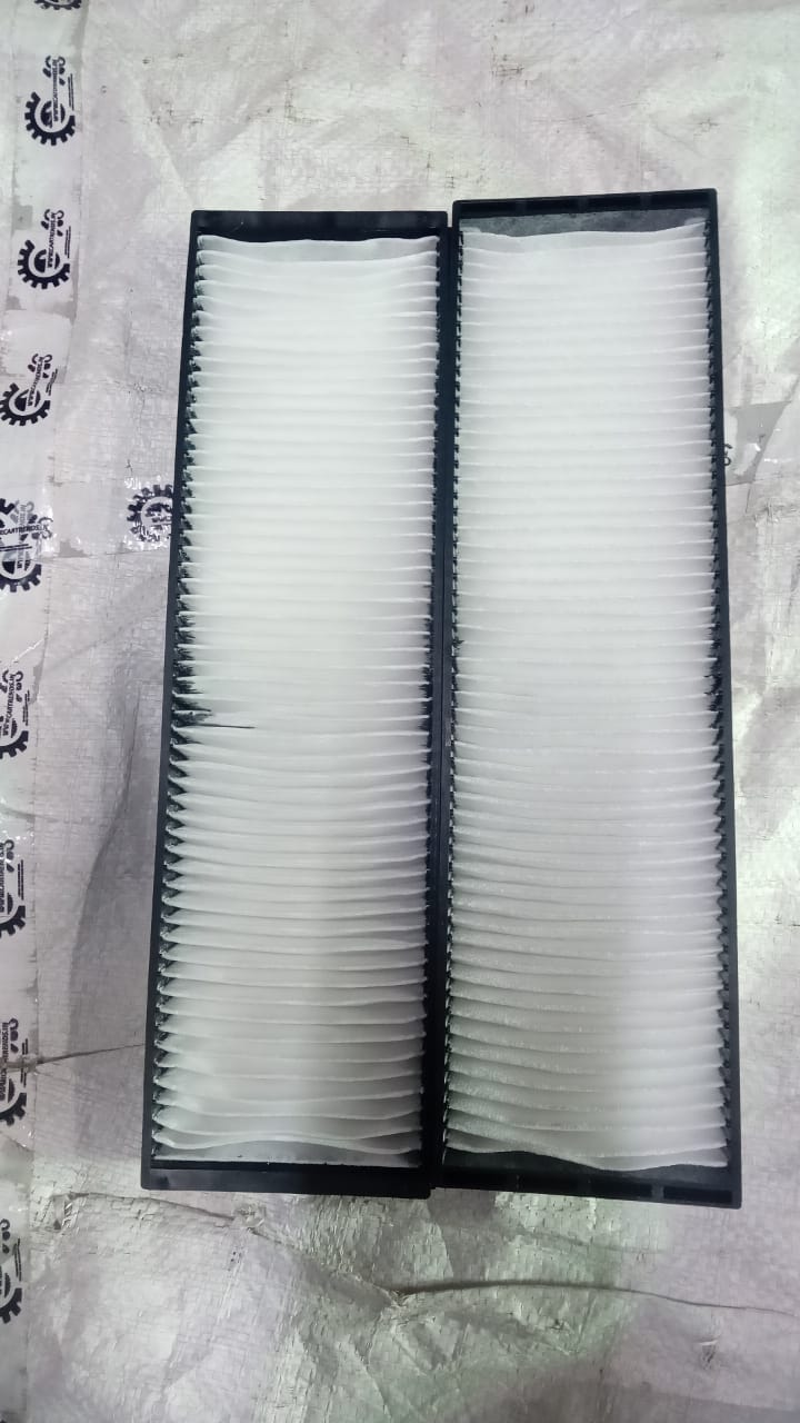 Hyundai I20 air conditioner filter, model #971331J000, showing the clean filter component for HVAC system.