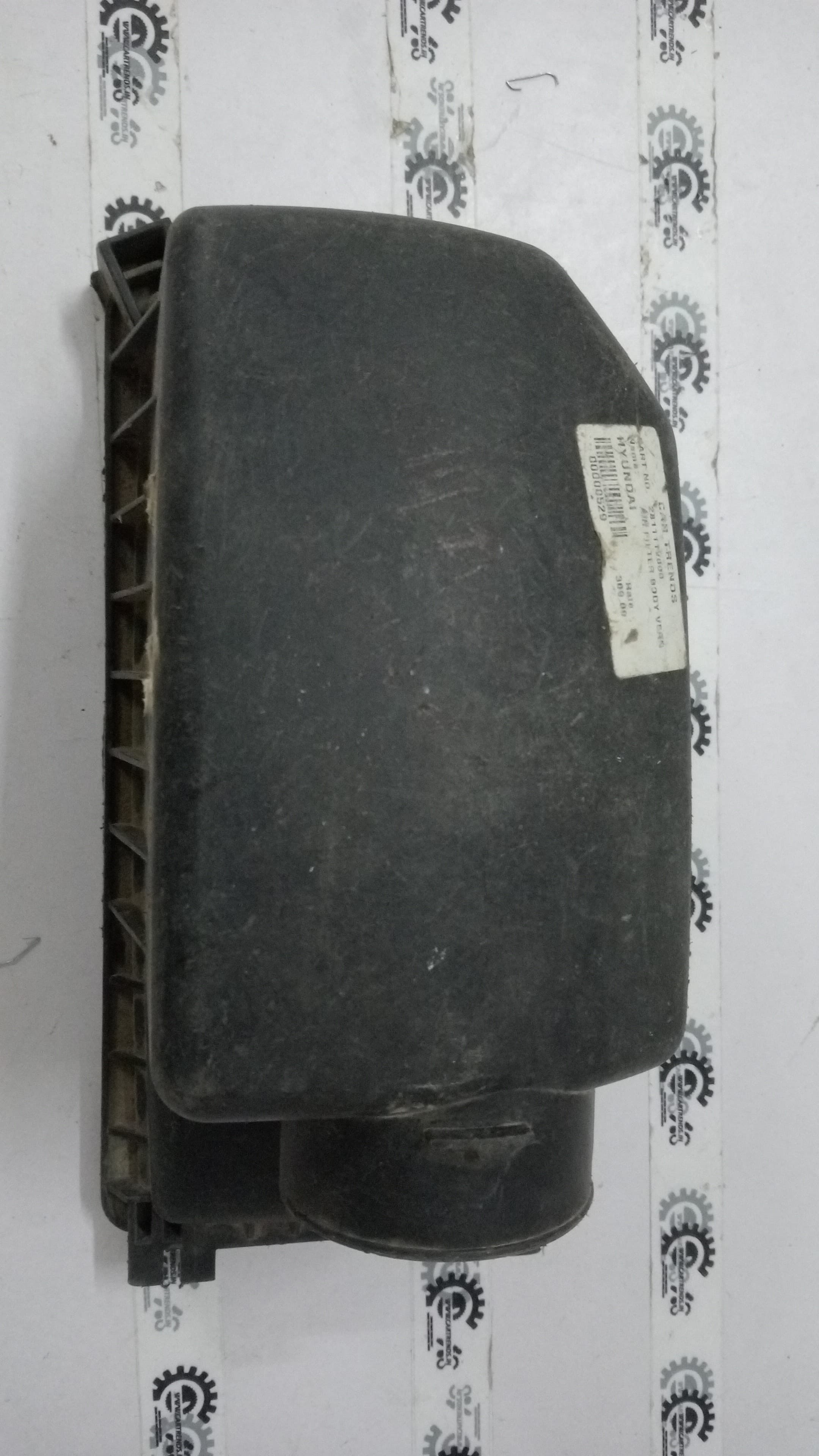 Hyundai Verna Fluidic upper air filter body cover, aftermarket replacement part, with black plastic design and mounting features.
